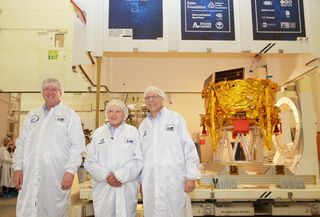 An Israeli lunar spacecraft, Beresheet, was loaded into a special shipping container and flown to Florida for launch. If successful, it will be the first privately-developed spacecraft to land on the moon. Photographed with the spacecraft from left to right are Opher Doron, IAI space division general manager; Morris Kahn, SpaceIL president; and Ido Anteby, SpaceIL CEO.
