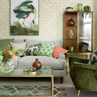 Geo patterns used in a green living room with glam accents
