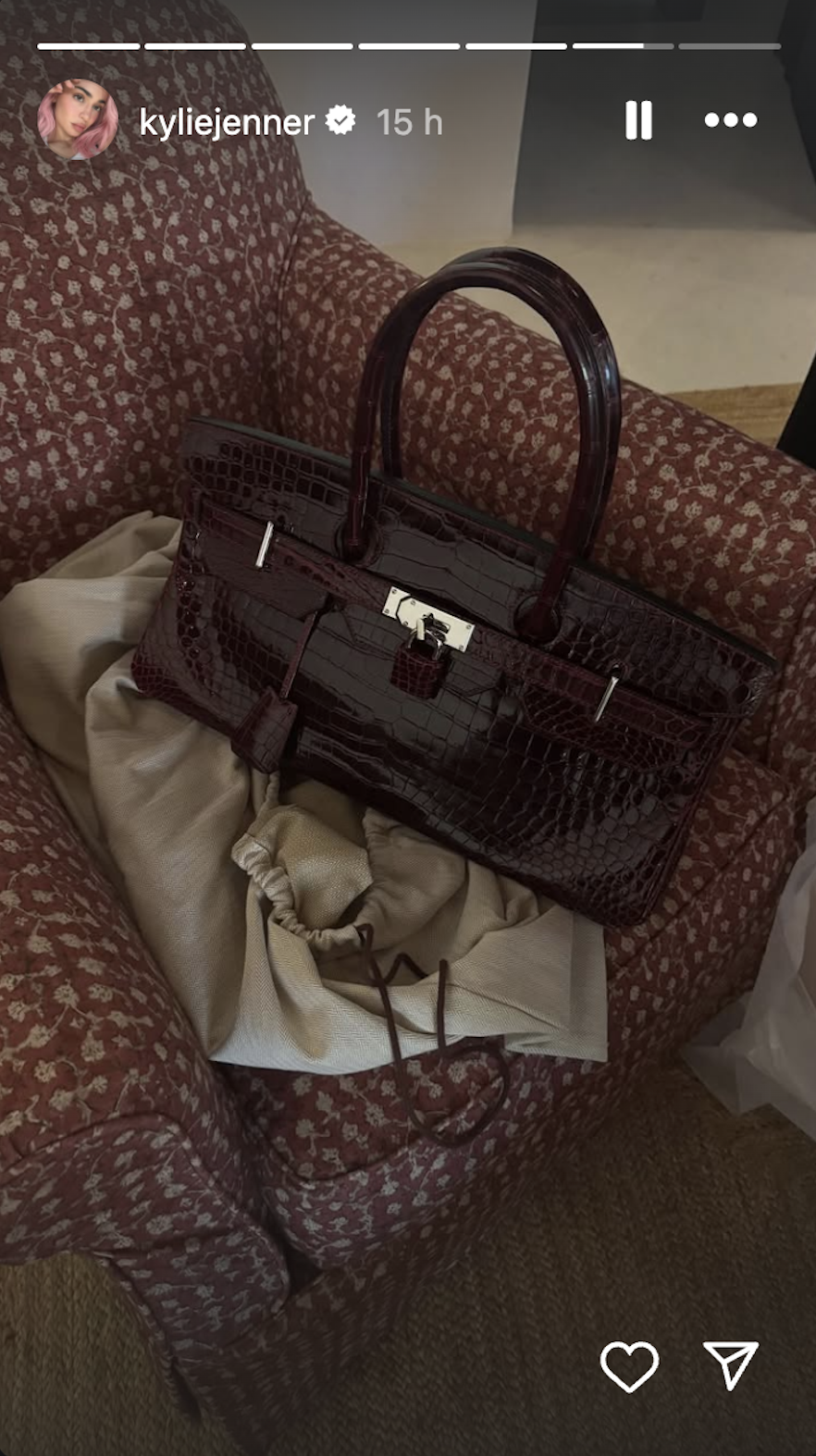 Kylie Jenner wearing a sheer lace Chloe blouse, jeans, and The Row leather flip-flops, and debuting her rare Hermes JPG shoulder Birkin