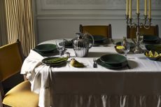 styled table with dark green plates