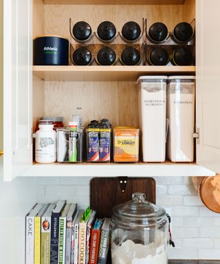 Water bottle storage inside a cupboard