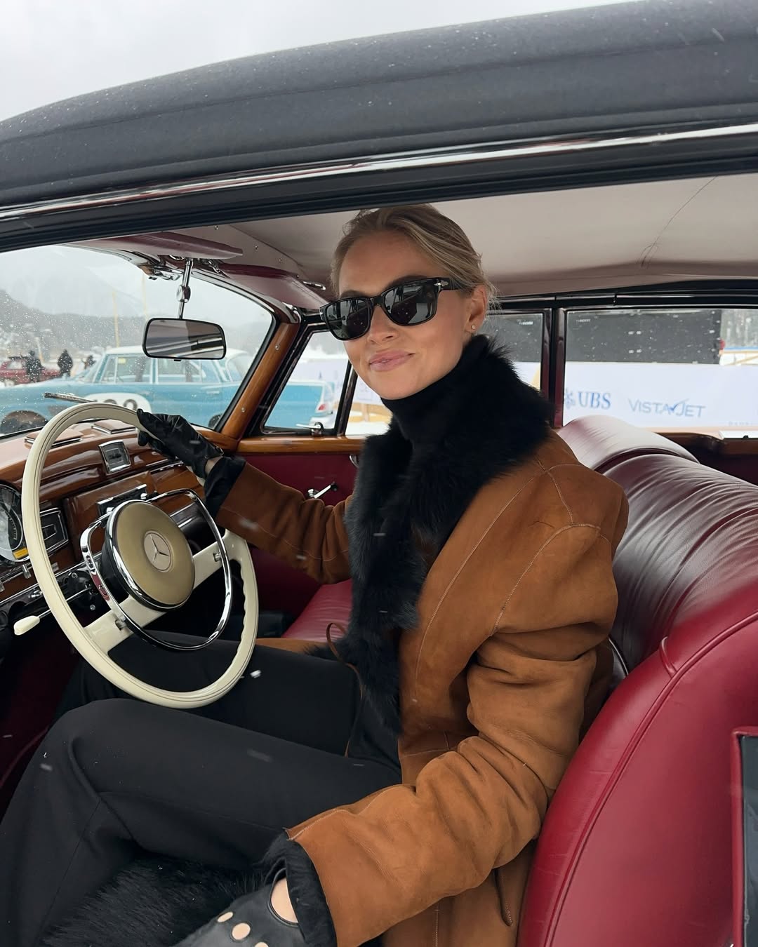 claire rose cliteur wears a suede jacket