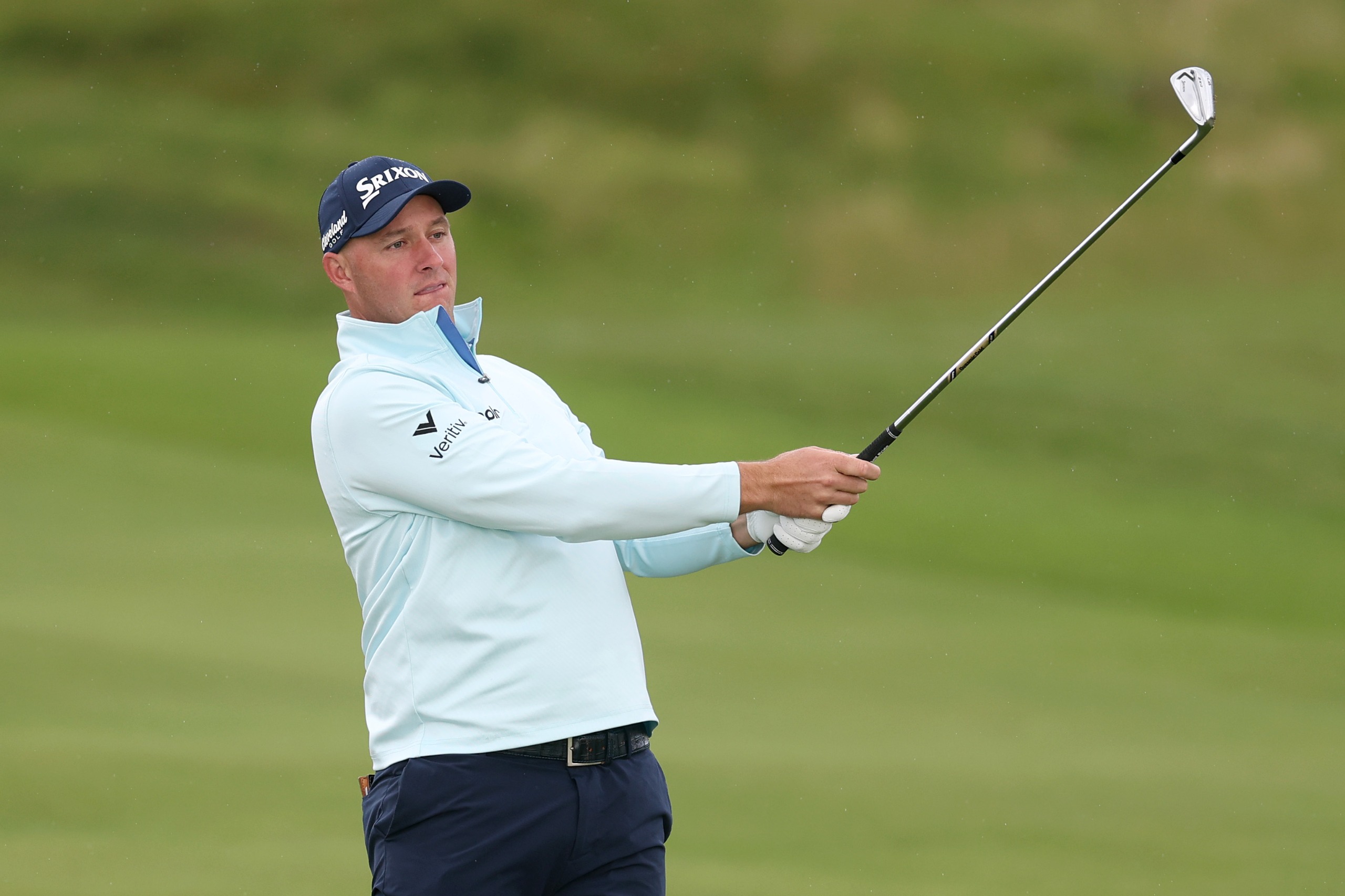 Sepp Straka hitting an iron shot