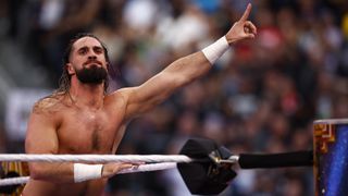 Seth Rollins gestures to the crowd ahead of the WWE Survivor Series 2023 live stream