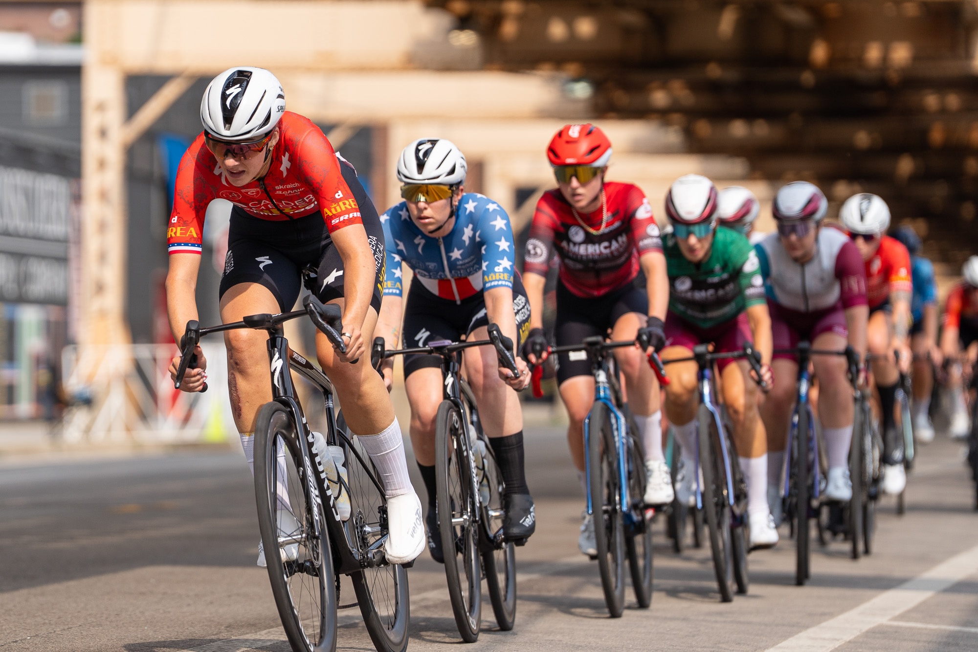 ACC women's race #4 at Fulton Market Grand Prix saw Caldera duo at front on the final lap and series leader Skylar Schneider, in red jersey, power by for the victory