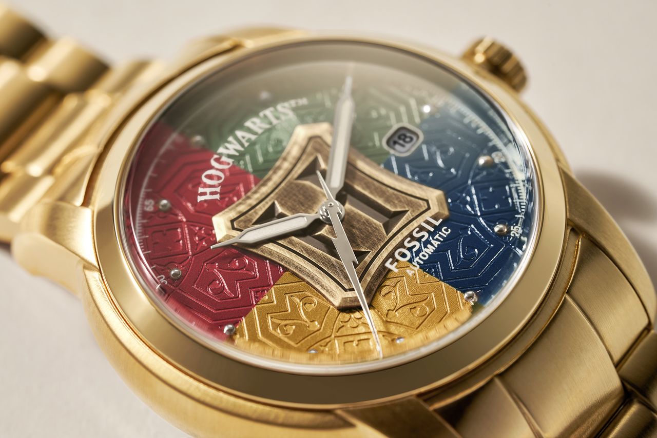 A closeup of the dial on the Harry Potter x Fossil automatic watch, showcasing the four-colour dial