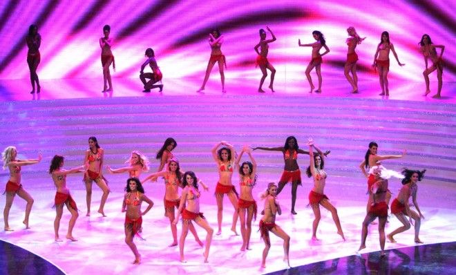 The 2007 Miss World contestants dance in their swimsuits. 