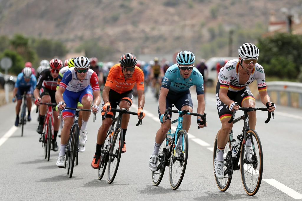 VELEFIQUE SPAIN AUGUST 22 LR Luis ngel Mat Mardones of Spain and Team Euskaltel Euskadi Alex Aranburu Deba of Spain and Team Astana Premier Tech and Maximilian Schachmann of Germany and Team Bora Hansgrohe compete during the 76th Tour of Spain 2021 Stage 9 a 188 km stage from Puerto Lumbreras to Alto de Velefique 1800m lavuelta LaVuelta21 on August 22 2021 in Velefique Spain Photo by Gonzalo Arroyo MorenoGetty Images