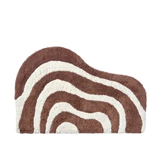 brown and white patterned bath mat