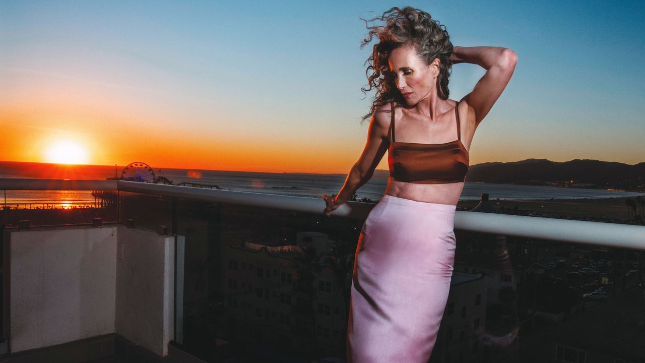 andie macdowell in front of a sunset