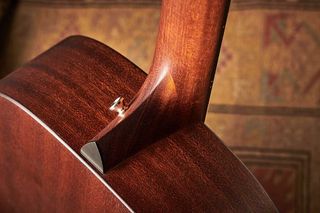 Notice the two-piece heel of the AD27 and see how similar the sapele body grain looks alongside that of the genuine mahogany neck.