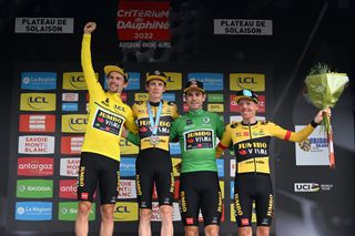 PLATEAU DE SALAISON FRANCE JUNE 12 LR Primoz Roglic of Slovenia Yellow Leader Jersey Jonas Vingegaard Rasmussen of Denmark Wout Van Aert of Belgium Green Points Jersey and Steven Kruijswijk of Netherlands and Team Jumbo Visma celebrate at podium as best team prize winner after the 74th Criterium du Dauphine 2022 Stage 8 a 1388km stage from SaintAlbanLeysse to Plateau de Salaison 1495m WorldTour Dauphin on June 12 2022 in Plateau de Salaison France Photo by Dario BelingheriGetty Images