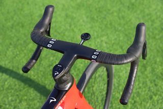 Image shows cockpit detail of a Pinarello F7 road bike