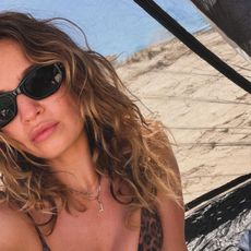 Lily James wears a leopard print bikini
