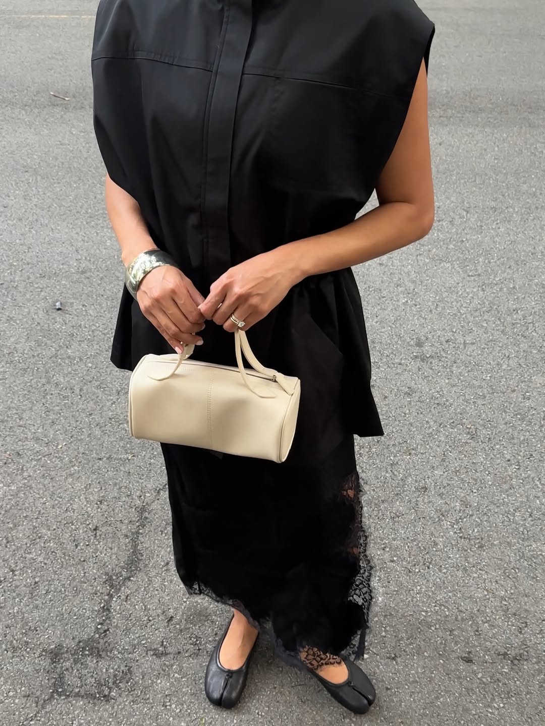 Dawn in black lace trim slip skirt with Tabi flats