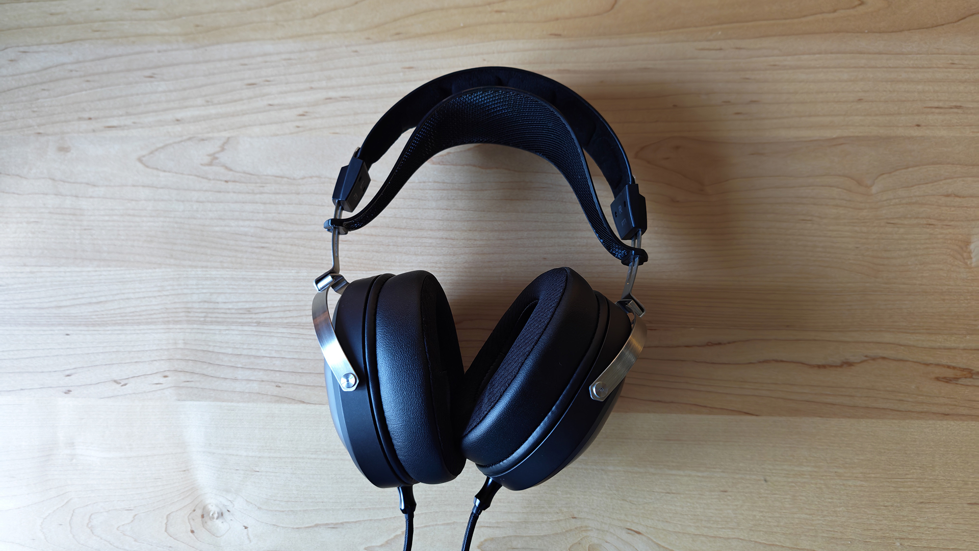 Various photos of the FiiO FT1 headphones, in a home office. 