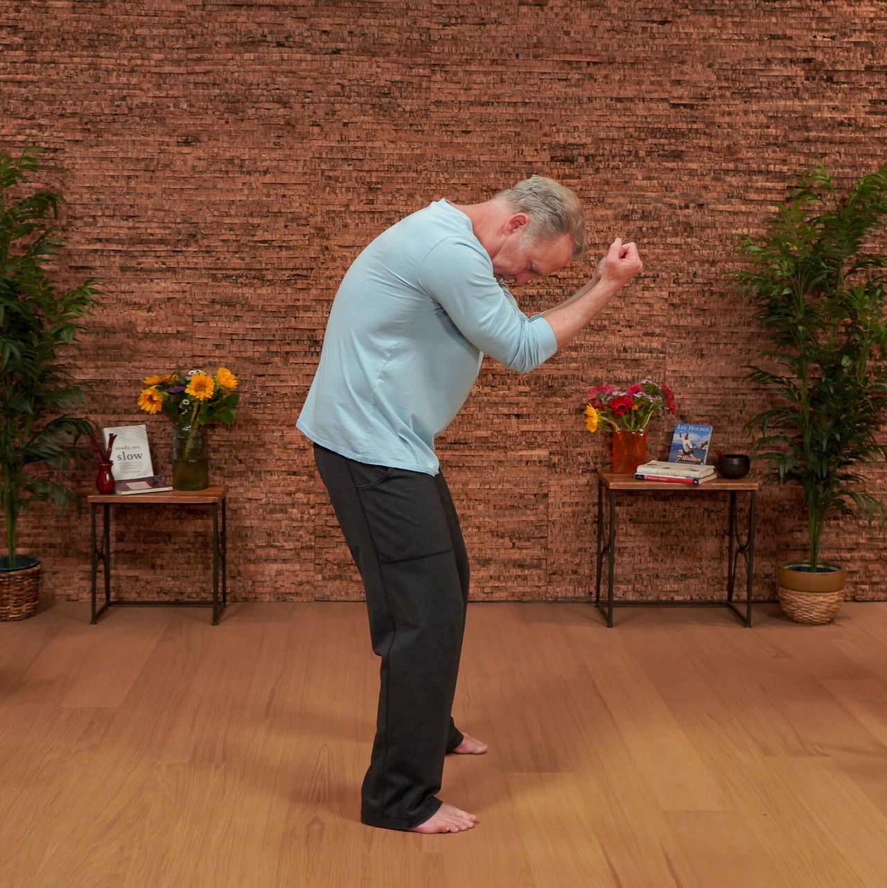 Man demonstrating Qigong movements