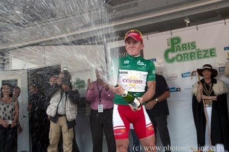 Race leader Samuel Dumoulin (Cofidis) lets loose with the bubbly.