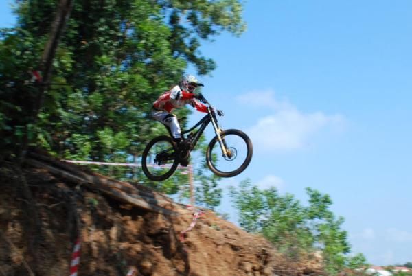 Risa Suseanty (Indonesia) catches some air en route to a second place finish in the elite women's downhill.