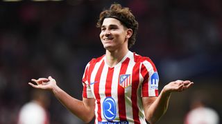 Julian Alvarez of Atletico de Madrid celebrates scoring his team's third goal and completing his hat-trick during the LaLiga EA Sports match between Atletico de Madrid and Rayo Vallecano de Madrid at Riyadh Air Metropolitano on September 24, 2025 in Madrid, Spain. 