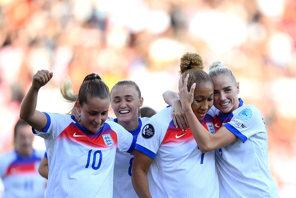 Lauren James is hugged by Alex Greenwood, Ella Toone and Georgia Stanway