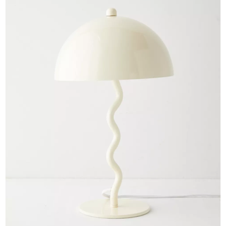 white table lamp with a wavy stem