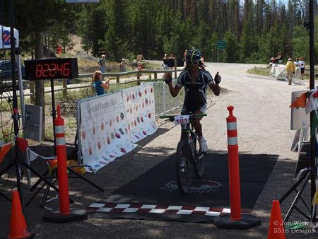 Tinker Juarez crosses the Butte 100 finish line in a record time of 8:22:41