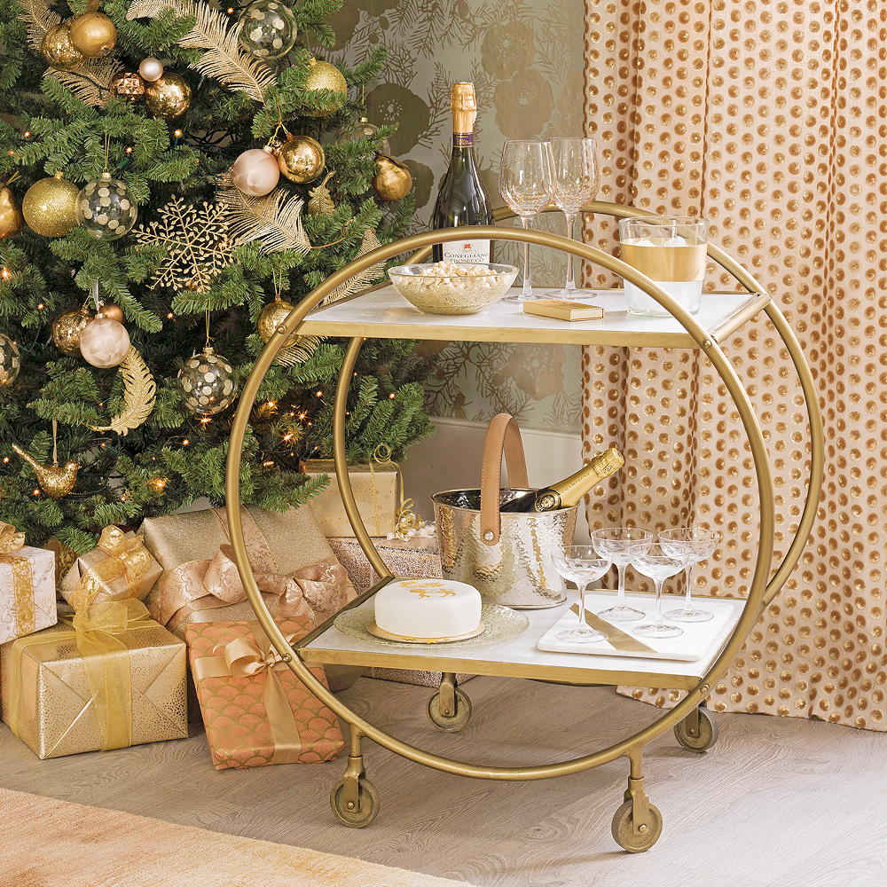 living room with golden trolley and drinks