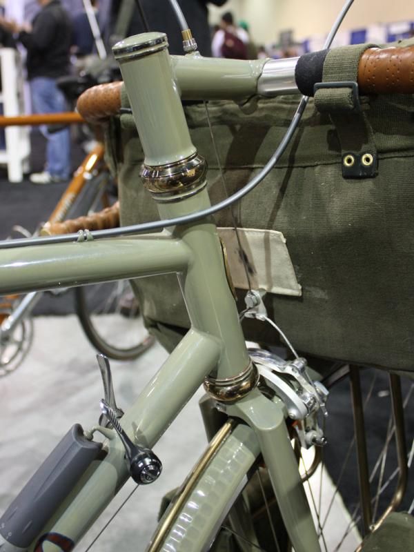 Stainless steel rings were used around both ends of the head tube and the top of the custom stem.