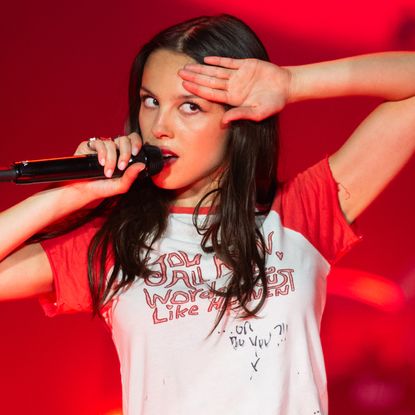 Olivia Rodrigo channeled Ginger Spice in Union Jack shorts at the Glastonbury Festival.