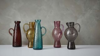 Coloured glass vessels, part of a collection for The New Craftsmen