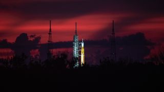 The Space Launch System (SLS) rocket awaits launch at Kennedy Space Center in Florida. The mighty rocket is key to NASA's Artemis program.