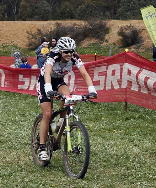 Australian Under 23 Womens Road Champion Peta Mullens crosses the line for second.
