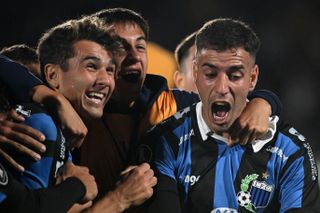 Liverpool FC (Uruguay) players celebrate with a goal against San Lorenzo in the Copa Libertadores in May 2024.