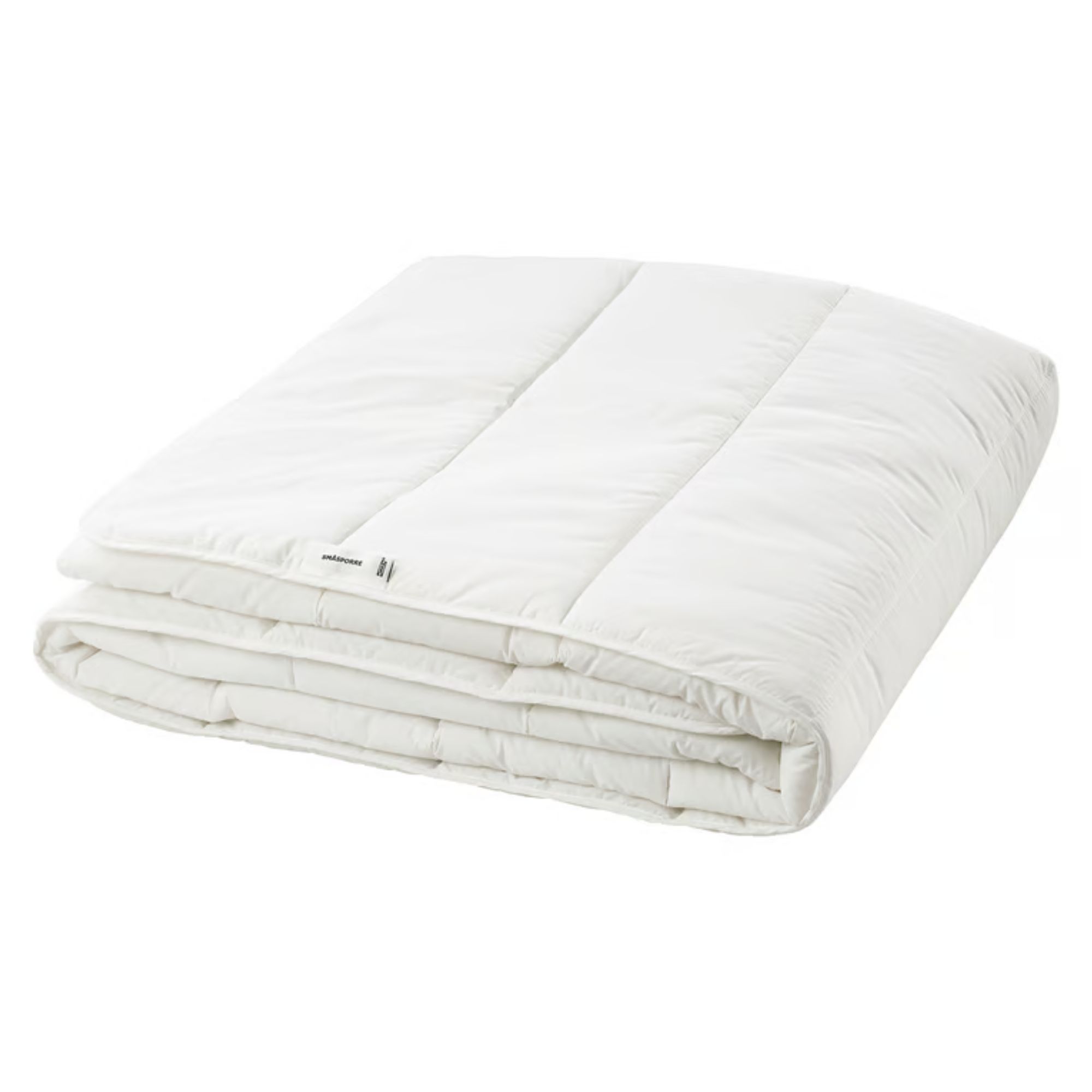 A folded white IKEA Smasporre duvet
