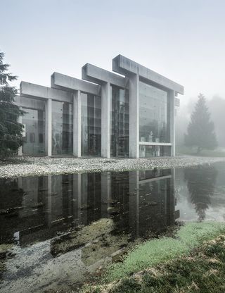 Museum of Anthropology at UBC, Vancouver, Canada showing modernist japanese inspired forms on misty day with artefacts inside