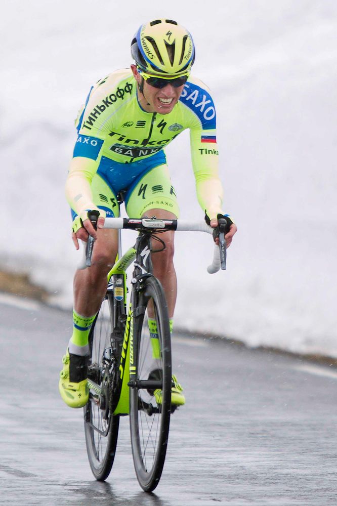 Jesper Hansen rides alone toward the finish.