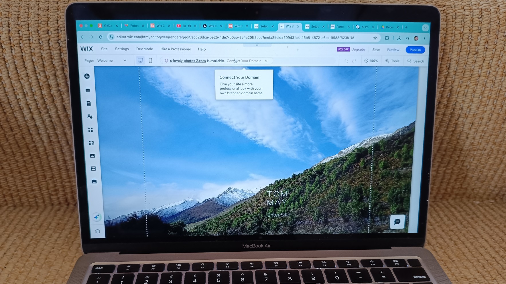 Laptop showing website being built in Wix Studio