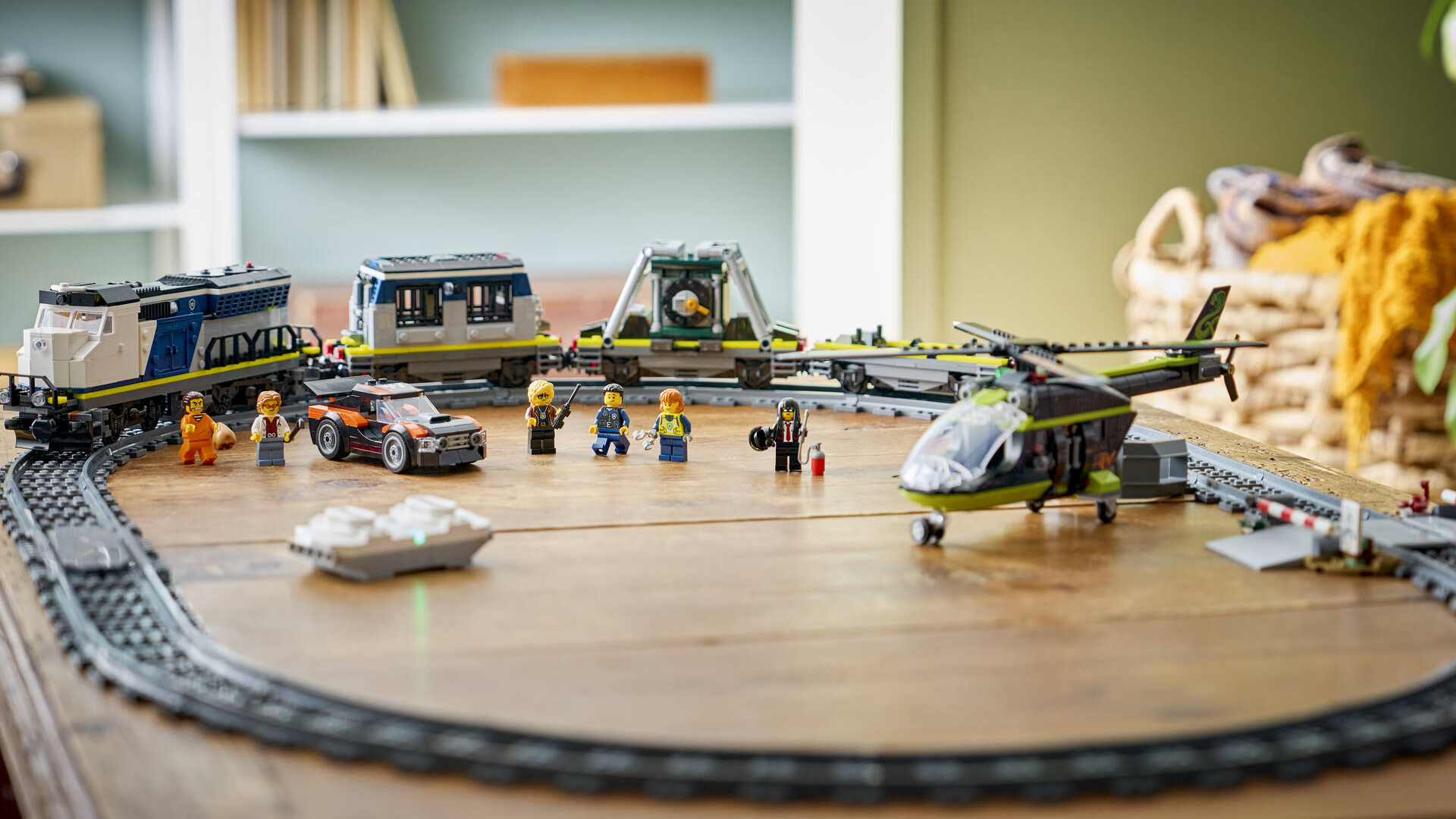 Lego Police Train Heist set on a wooden table