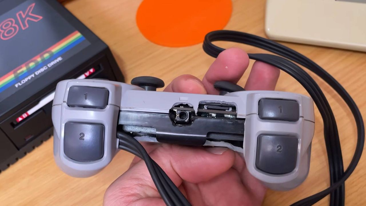 Top view of PlayStation PUGA PS1 plug-and-play controller console.