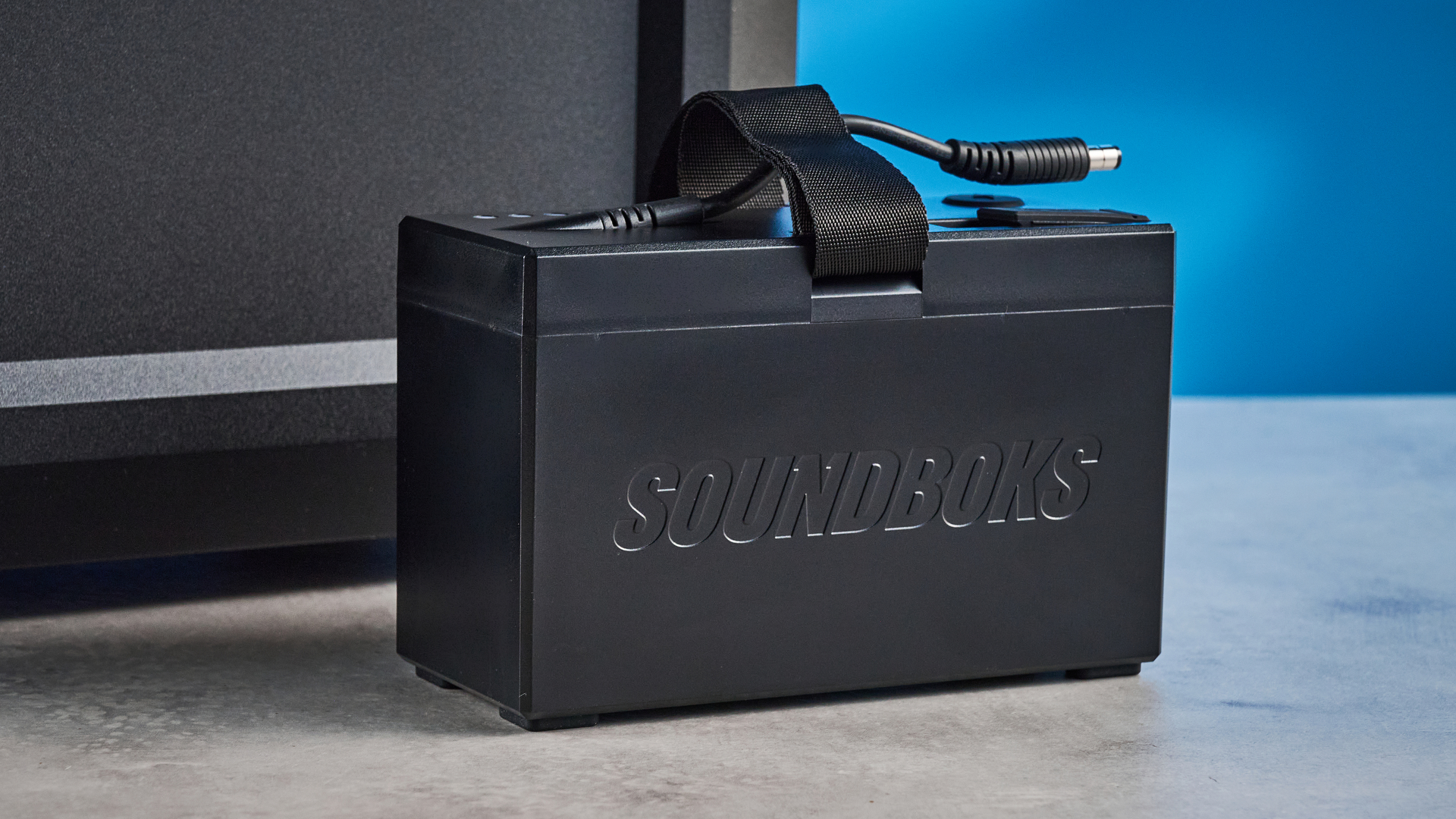 A black Soundboks Mix party speaker