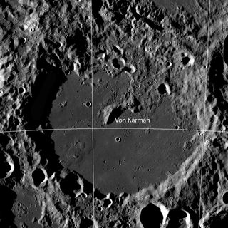 This image features the moon's Von Kármán crater (115 miles, or 186 kilometers in diameter). The Lunar Reconnaissance Orbiter Camera took this mosaic image, over which a 5-degree latitude and longitude grid was added.