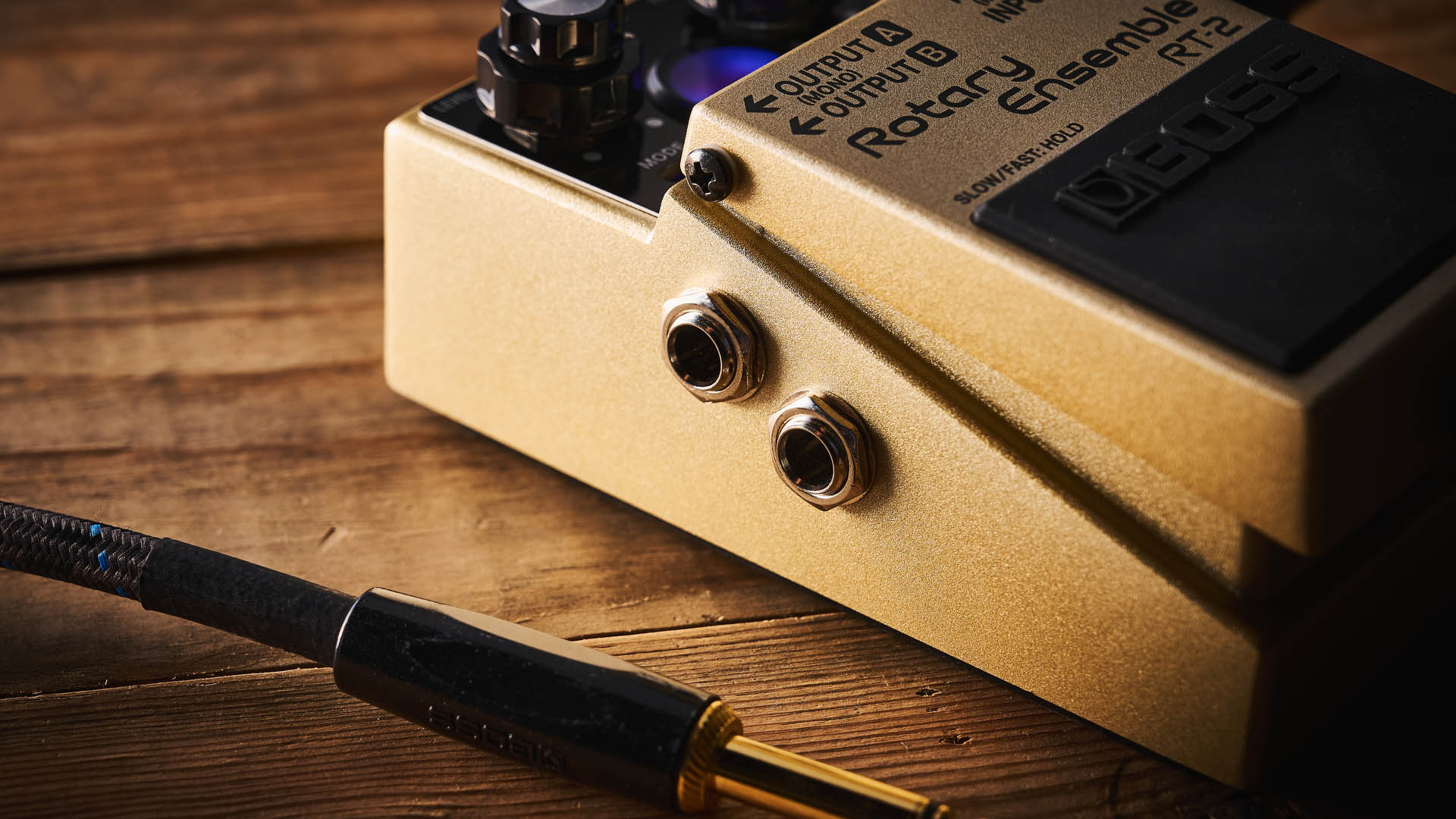 The Boss RT-2 Rotary Ensemble pictured in close-up against a wooden floor.