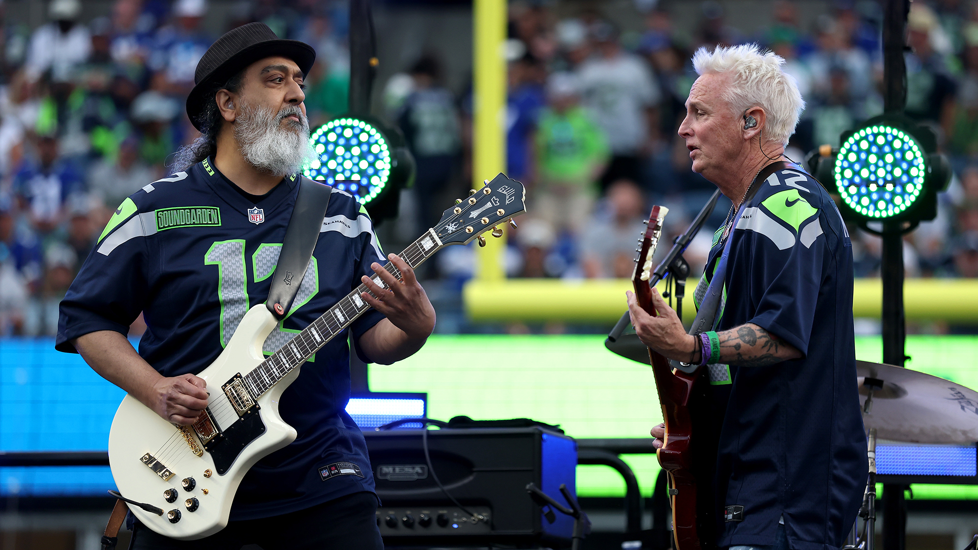 Kim Thayil of Soundgarden and Mike McCready perform during halftime in the game between the Seattle Seahawks and the New England Patriots