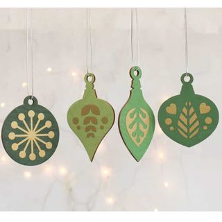 Green and gold wooden tree decorations