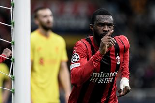 Fikayo Tomori celebrates after scoring for AC Milan against Liverpool in the Champions League in December 2021.