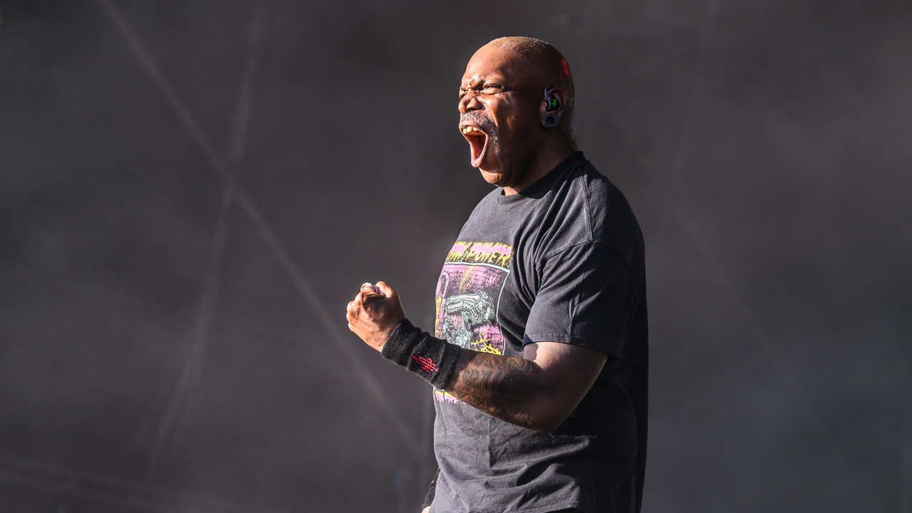 Derek Green roaring on stage