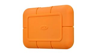 The Lacie Rugged SSD in orange on a blank background
