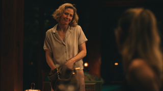 Carrie Coon as Laurie in her pjs in The White Lotus