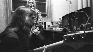 Greg Allman (background) and Berry Oakley backstage before the Allman Brothers' performance at the Sitar on October 17, 1970 in Spartanburg, South Carolina